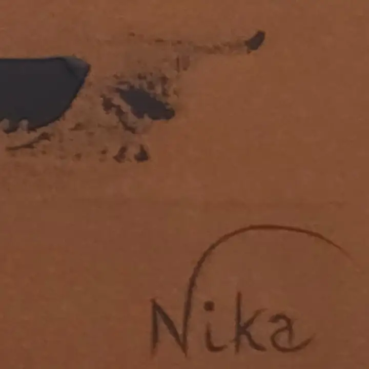 Close da assinatura Nika no canto da segunda tela